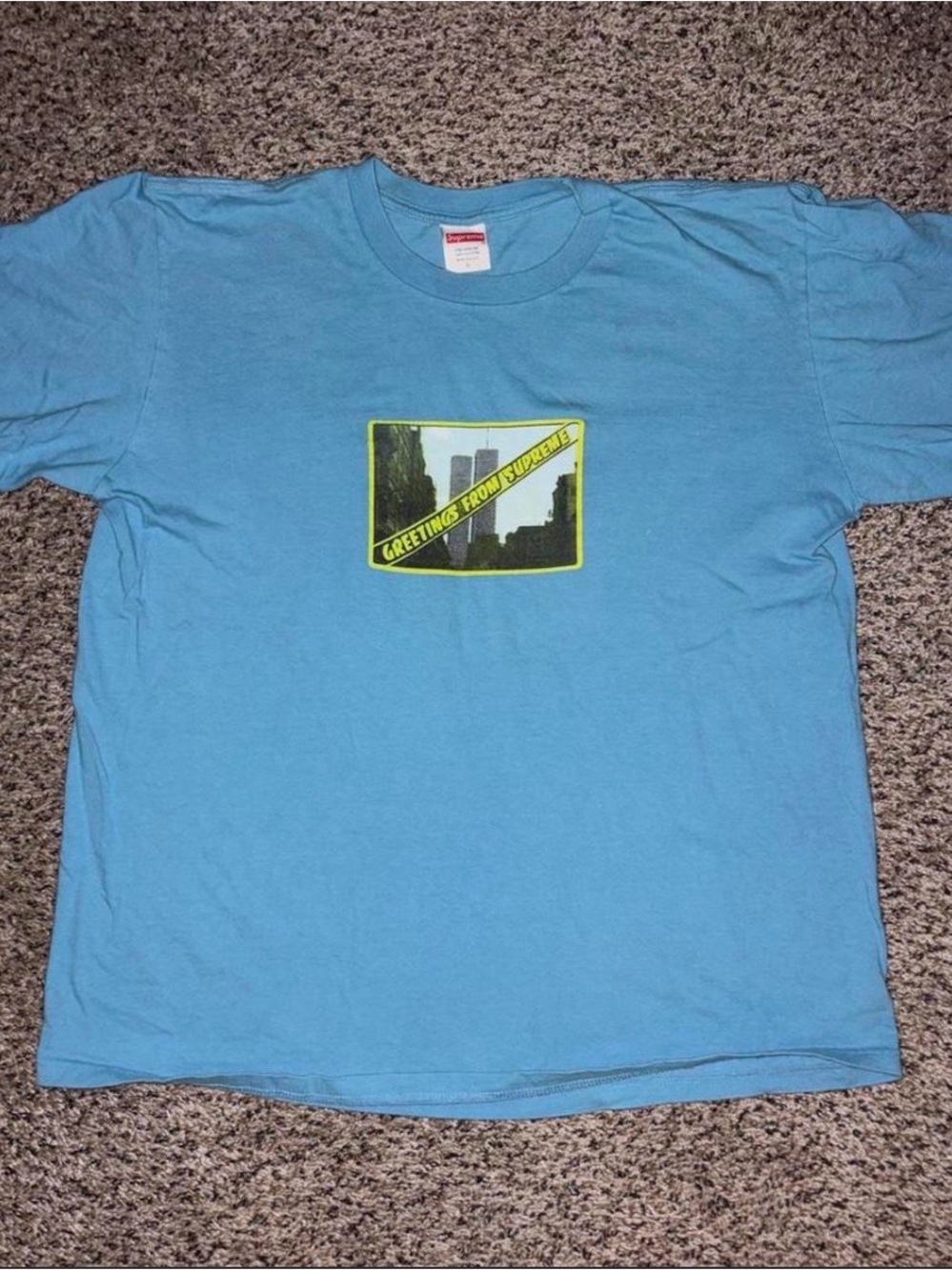 Supreme Light Blue Crewneck T-Shirt with Yellow Graphic